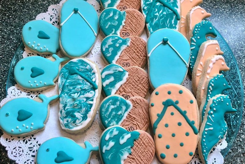 Wedding cookies in bright beach-themed colors